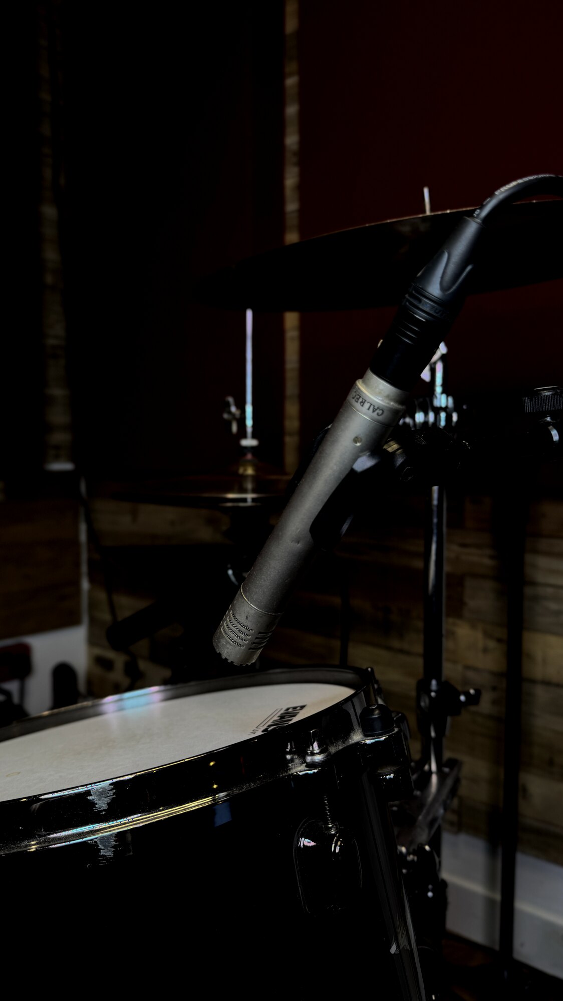 Calrec microphone positioned over a snare drum