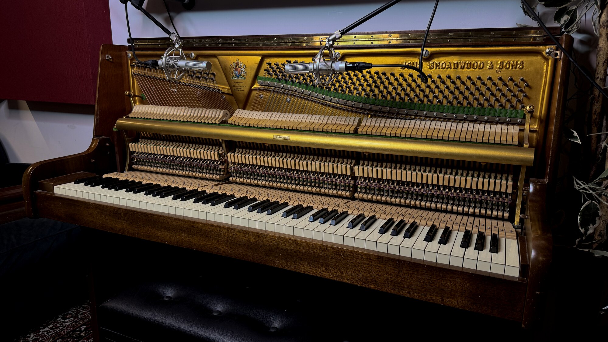 Upright piano prepared with microphones in the studio
